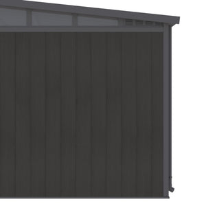 Dark gray metal shed with a slanted roof