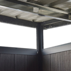 Close-up of a metal frame with glass panels on a white background garden shed