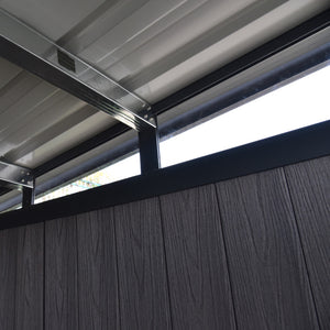 Metal roof structure with a window and wooden wall