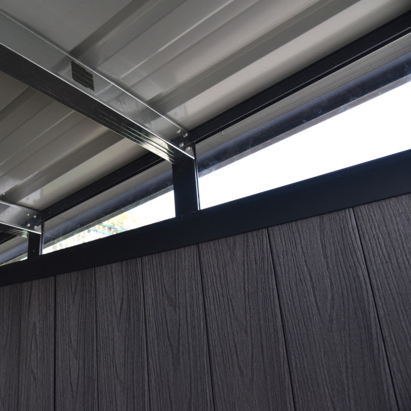 Metal roof structure with a window and wooden wall