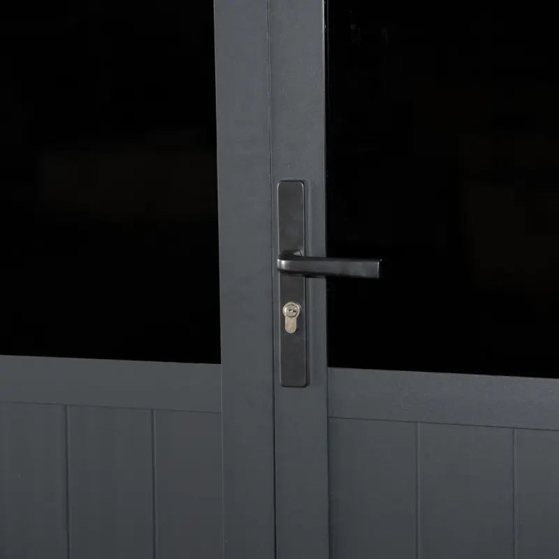 Dark gray door with a handle and lock on a black background Front View